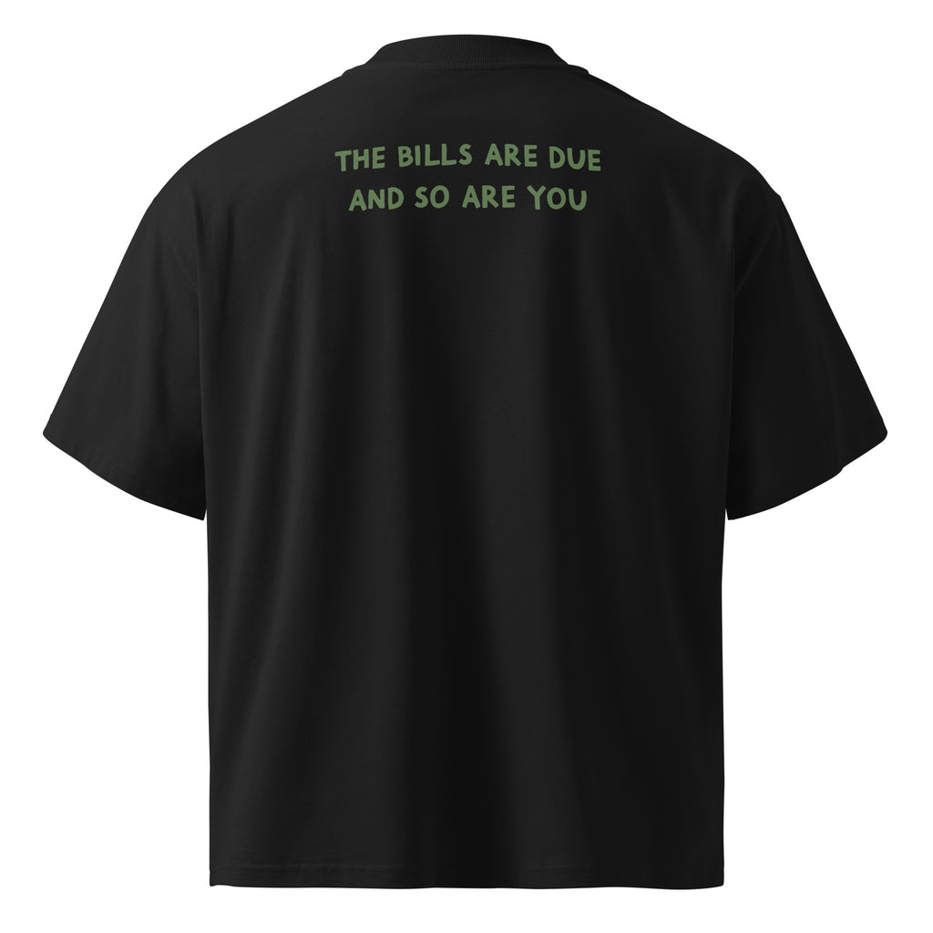 Back of the Amor Budget Heart & Receipt oversized tee in black, printed across the upper back with "THE BILLS ARE DUE AND SO ARE YOU" on two lines in olive green.